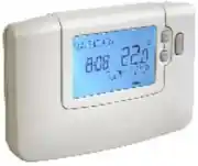 Honeywell CM 907 thermostat turned on with heating in operation and active backlit display.